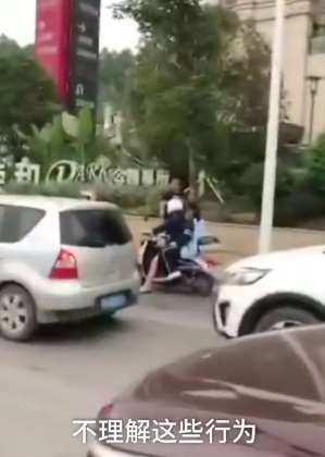 难道真是为了钱?南宁一男子抓拍举报交通违法遭质疑!