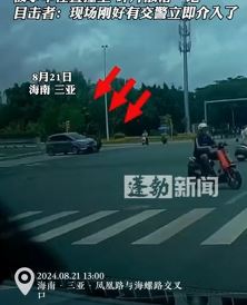 三亚一电动车疑闯红灯被撞飞