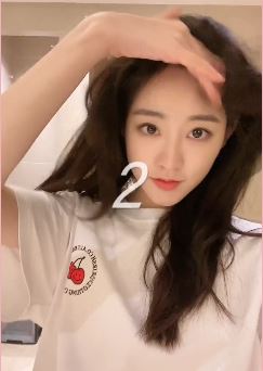 祝绪丹收工后凌乱发型出镜 五官精致怎么看都是美哒哒