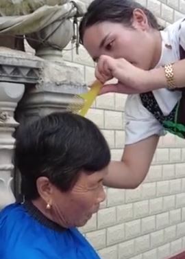 湖南一女子每周2天抛下生意为老人义剪