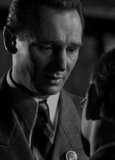 灰暗中唯一的鲜红，源于「辛德勒的名单」