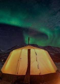 格陵兰岛之旅，在冰峡湾的北极光下露营